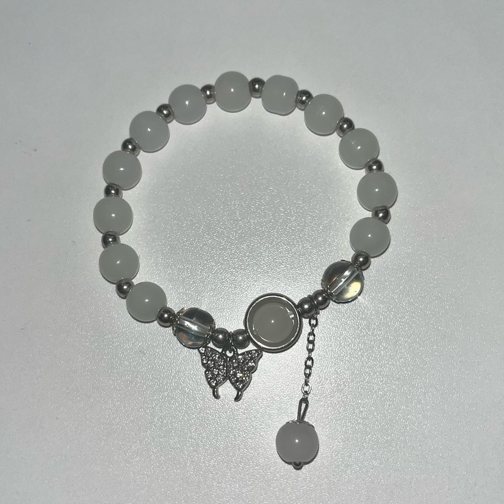 Medium size, white and silver bracelet with butterfly charm.
